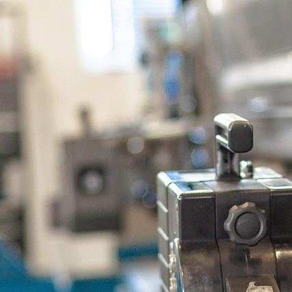 car lift and wheel alignment equipment in automotive workshop